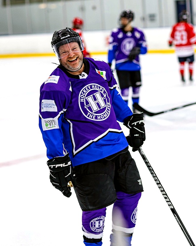 Caleb Carisse playing in the Hockey Helps the Homeless charity game