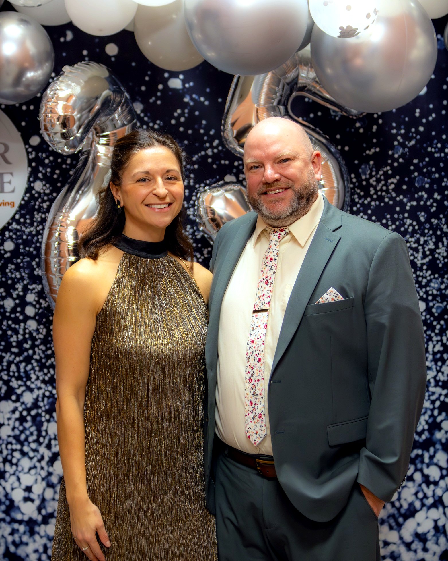 Caleb Carisse and his wife at a hospital foundation gala